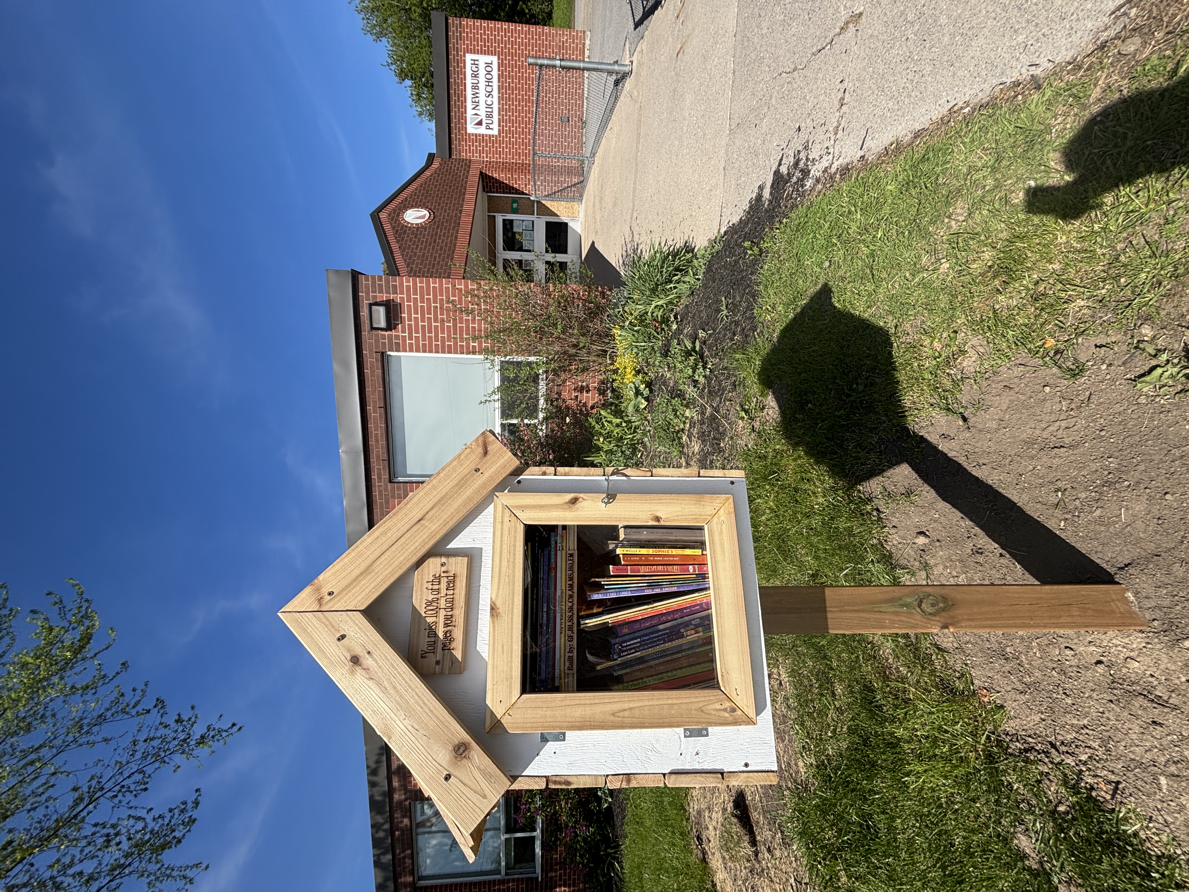 A little community library is displayed outside the front of Newburgh PS