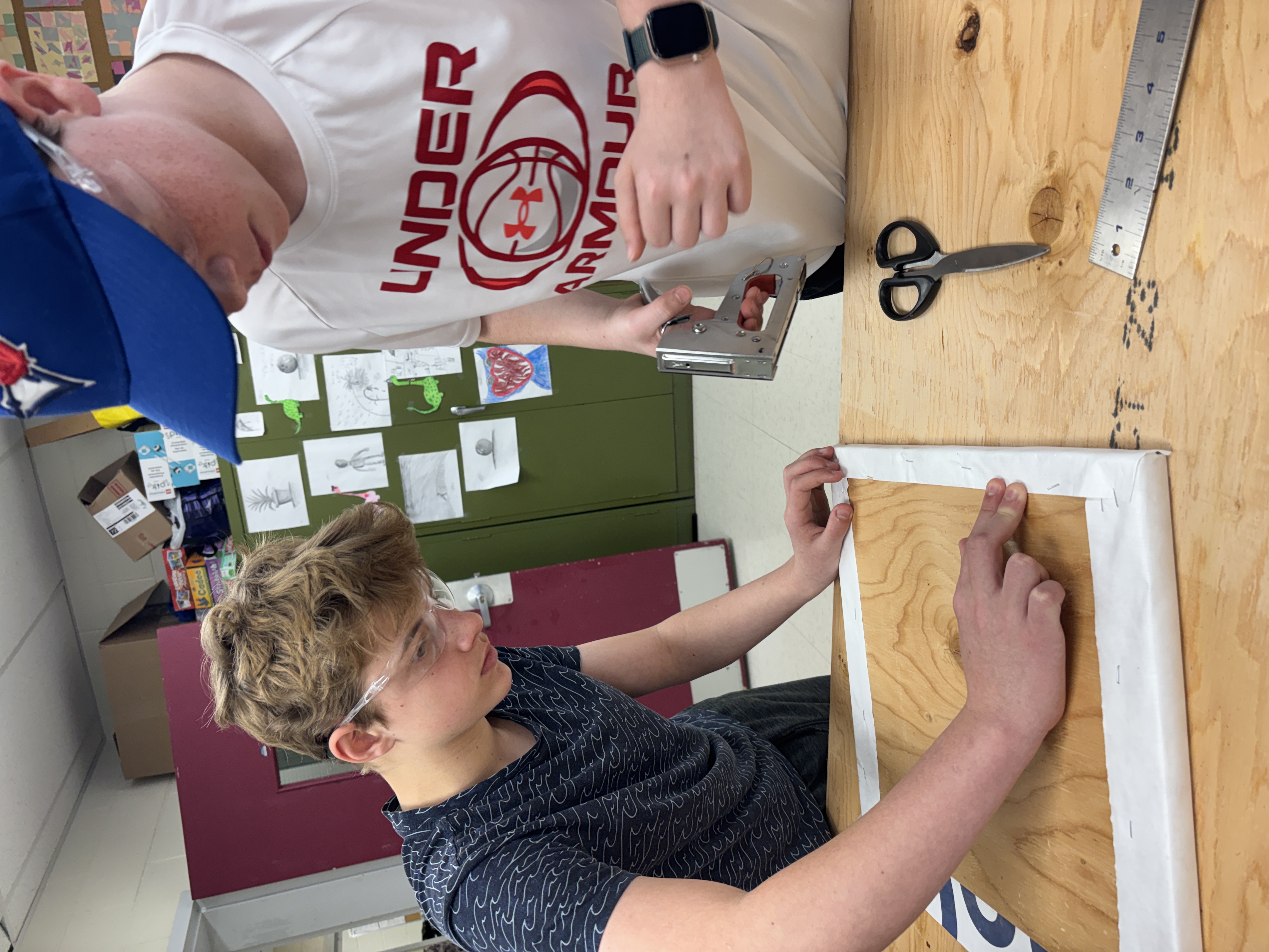 Two Newburgh PS students work on the little community library project